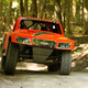 Illustration for article titled Watch Robby Gordon Do Barrel Rolls On An English Lords Lawn